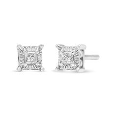 Add a little sparkle to your outfit with these sterling silver stud earrings. This unique design features 1/4ct TDW in diamonds. A glittering princess cut diamond sits inside of a cool sterling silver frame, while a hidden halo additional round cut diamonds are set into the sides of the stud. Comes with a push back mechanism for a secure fit. Fine Jewelry Princess Cut Diamond Earrings With Accents, Princess Cut Diamond Earrings With Accents In White Gold, White Gold Diamond Earrings With Princess Cut, Princess Cut White Gold Diamond Earrings With Accents, White Gold Princess Cut Diamond Earrings, Princess Cut White Gold Diamond Earrings, Gift Diamond White Baguette Diamond Earrings, Gift Diamond White Earrings With Baguette Diamonds, Sterling Silver Princess Cut Diamond Earrings