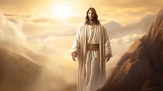 jesus standing on top of a mountain with his arms outstretched