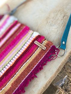 Handwoven bag in stripes of pinks and orange with magenta trim. The bag has a handstritched lining of cotton fabric in a playful print.  it is  finished with an imitation leather strap. The bags measure 9 inches wide x 9 inches tall and hangs 18 inches from the top of the strap to the bottom of the bag. the perfect size for carefree summer evenings out.  this bag is also available in white stripes  https://www.etsy.com/listing/1549837803/handwoven-handbag-white-stripes?click_key=053ba39a0ab8002a Pink Leather Handles Crossbody Shoulder Bag, Pink Leather Handled Crossbody Shoulder Bag, Pink Leather Handle Crossbody Shoulder Bag, Pink Leather Crossbody Shoulder Bag With Leather Handles, Everyday Pink Handwoven Shoulder Bag, Life In Italy, Handwoven Bag, Liguria Italy, Summer Evening