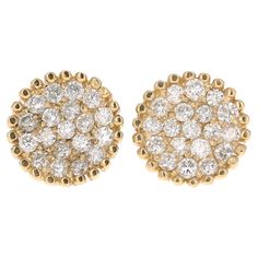 This unique design of diamond earrings have 38 Round Cut Diamonds that weigh 0.46 carats. The Clarity of the diamonds is SI and the Color is F. The total carat weight of the earrings is 0.46 carats. The backing of the earring is a standard push back. The Earrings are made in 14K Yellow Gold and weigh approximately 1.8 grams. The width of the earrings are 9 mm. Yellow Gold Earrings, Yellow Gold Earring, Round Cut Diamond, Round Cut, Gold Earrings, Diamond Earrings, Unique Design, Jewelry Earrings, Unique Designs