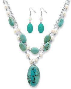 Wow, you'll be sure to make a statement with this stunning necklace and earring set! The beautiful double-chain necklace features oval-shaped turquoise disks and cultured freshwater pearls, plus an eye-catching turquoise pendant at the center. Adjustable length from 17 to 20. Plus, complete your look with the matching earrings in silvertone - perfect for any occasion! Instantly elevate your fave plus size dresses and tops with the perfect piece of jewelry PalmBeach Jewelry Genuine Turquoise and Freshwater Pearl Silvertone Necklace and Earrings Set | White | Accessories | Materials & Care Instructions: ['Imported'] Palm Beach Jewelry, Women's Jewelry Sets, Necklace And Earrings Set, Jewelry Show, Necklace And Earring Set, Freshwater Cultured Pearls, Genuine Turquoise, Freshwater Pearl Necklaces, Stunning Necklace