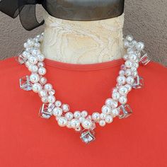 "This Beautiful Pearl and Caged Crystal Chunky Statement Necklace is made using my exclusive and unique Twisted Sister Technique I invented to make OOAK Statement Jewelry. It would make an amazing bridal necklace or for any special occasion. I just love the caged crystal dangles. So Unique! Your choice of 3 Lengths are available 18, 20 or 22\"s in with a 4\" Silver Plated Extender Chain with a lobster claw clasp. This handmade item is one of a kind. Truly unique. This is a must have Statement pi Unique Pearl Necklace For Wedding, White Crystal Embellished Jewelry For Anniversary, Unique Pearl White Jewelry For Wedding, Dazzling White Bridal Necklace For Party, Dazzling White Bridal Necklace For Celebration, Unique Silver Bridal Necklace, Unique Silver Bridal Necklace For Wedding, Clear Crystal Necklace For Weddings, Unique White Wedding Jewelry