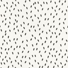 black and white polka dots on a white background