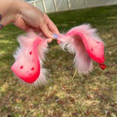 Valentines Day Puppy Ears Headband and large curled husky tail!

Pink floppy puppy ears with pink / red airbrush shading. Added red heart spots onto ears with heart “love” charm hanging from ear. PLEASE NOTE! THE LOVE CHARM WILL BE DIFFERENT THAN THE PHOTO, MY SUPPLIER FOR THE HEARTS IN THE PHOTO SOLD OUT, THE NEW HEART CHARM WILL BE SIMILAR!
Tail is 23 inches long with a belt loop! Tail comes with waist tie ribbon. Cute Lovecore, Puppy Ears And Tail, Puppy Ears Headband, Husky Tail, Ears And Tail Set, Puppy Ears, Ears And Tail, Pink Puppy, Dog Ears