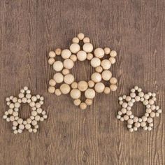 three different types of beads on a wooden surface