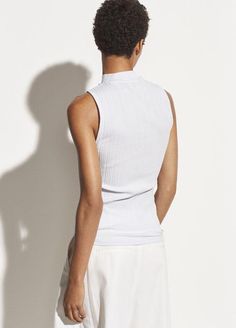 An essential white tank that's perfect for any season. Style #V647183465 Black Sweater Outfit, Cashmere Hoodie, Cami Nyc, Online Lingerie, Dressy Pants, Short Dresses Casual, Sleeveless Tshirt, Casual Denim, White Tank