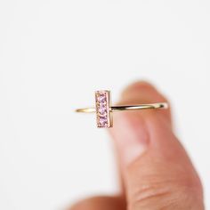 Pink Sapphire Ring, Vertical Bar Ring, Gold Bar Ring, Gold Bar Ring, Modern Gold Ring, Modern Sapphire Ring, Simple Gold Ring, Simple Gold Ring, Pink Gold Ring, Ring for Women, A 14K gold ring with three pink sapphires, brilliant cut, on a vertical bar. A modern minimalist geometric ring. A simple and delicate ring for women, ideal for stacking. The best gift for her. 100% handcrafted with love! D E T A I L S ● Metal: 14K solid yellow gold, 14K white gold ● Gemstones: Pink Sapphires ● Weight: 0. Modern Sapphire Ring, Modern Gold Ring, Gold Bar Ring, Pink Gold Rings, Gold Rings Simple, Vertical Bar, Bar Ring, Pink Sapphire Ring, Simple Ring