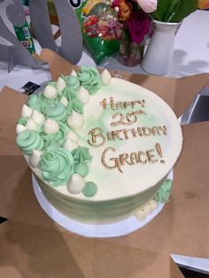 a birthday cake sitting on top of a table