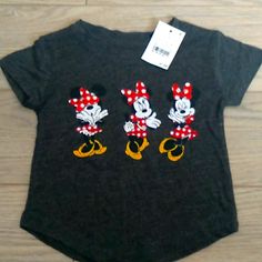 Disney Minnie Girls, Gray Tee, Short Sleeved, Round Hem, 65% Polyester 35% Rayon Minnie Mouse Cotton T-shirt, Cotton Minnie Mouse T-shirt With Short Sleeves, Cotton Minnie Mouse Short Sleeve T-shirt, Playful Minnie Mouse Short Sleeve Top, Playful Minnie Mouse Cotton T-shirt, Playful Minnie Mouse Crew Neck Top, Casual Mickey Mouse Tops For Playtime, Cotton Minnie Mouse Shirt With Short Sleeves, Cotton Mickey Mouse Top For Playtime