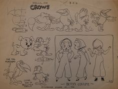 an old sheet with some cartoon characters on it's back side and other drawings