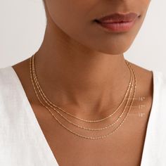 Crafted from 14k gold, this exquisite Singapore chain necklace features a twist design that catches the light with every movement.

Necklace has an adjustable length and can be worn at 16”, 17”, and 18”. Elegant Gold Adjustable Rope Chain Necklace, Elegant Gold Rope Chain Necklace With Adjustable Chain, Elegant Rope Chain Necklace For Everyday, Elegant Everyday Delicate Rope Chain Necklace, Elegant Gold Figaro Rope Chain Necklace, Elegant 14k Gold Rope Chain Necklace, Elegant Delicate Rope Chain Necklace Gift, Elegant Yellow Gold Rope Chain Necklace Gift, Elegant Delicate Rope Chain Necklace