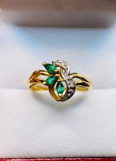 Beautiful Vintage 14k Yellow Gold Natural marquise Shape Emerald Ring 100% Natural Emeralds And Diamonds Emerald(s)                                     0.30CT Diamond:                                      0.02 CT Color:                                                      G Clarity:                                                  SI1 Total ring weight:                          3.0vGR 14k Yellow Gold Ring sizing available free of charge For more information regarding this item feel free to reach Yellow Gold Marquise Emerald Ring, Heirloom Marquise Emerald Ring In 14k Gold, Fine Jewelry Marquise Emerald Ring With 17 Jewels, Fine Jewelry Marquise Emerald Ring, Fine Jewelry Yellow Gold Marquise Birthstone Ring, Fine Jewelry Marquise Birthstone Ring In Yellow Gold, Marquise Emerald Yellow Gold Rings, Marquise Emerald Ring Fine Jewelry, Marquise Yellow Gold Birthstone Ring Fine Jewelry