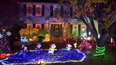 a house decorated with christmas lights and decorations