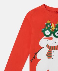 Fun Winter T-shirt With Crew Neck, Winter Holiday Long Sleeve T-shirt, Festive Long Sleeve Top For Holidays, Festive Long Sleeve Tops For Holiday, Festive Long Sleeve Holiday Top, Long Sleeve Tops For Holiday Festivities, Long Sleeve Cartoon Print T-shirt For Winter, Playful Winter Cotton Tops, Playful Cotton Winter Tops