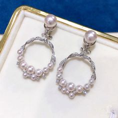 Highlight: Exquisite and Elegant Style Product Information OriginJapan MaterialAkoya Pearl, 18k Gold, and Diamond DimensionsApprox. 4 x 2.2 cm Pearl Shaped: Round Size: 3-7.5 mm Quality: AAA Nacre: Very Thick Color: White Luster: Aurora Accessories Metal: 5.75 g of 18k White Gold Other: 0.61 ct of SI Quality Natural Diamond Akoya Pearl Ring, Pearl Chandelier Earrings, Akoya Pearl Earrings, Pearl Chandelier, Golden South Sea Pearls, Luxury Earrings, Akoya Pearls, South Sea Pearls, Sea Pearls