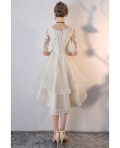 Shop Light Champagne Lace Ruffled Wedding Party Dress with Sleeves online. All instock with free shipping. Pro since 2009. Knee-length Tea Length Dress For Wedding And Prom Season, Fitted Knee-length Tea Dress For Wedding, Spring Banquet Wedding Dress, Knee-length Evening Dress With Ruffles For Wedding, Fitted White Tea Length Wedding Dress, Spring Wedding Dress For Banquet, Spring Banquet Fitted Wedding Dress, Knee-length Lace Dress For Wedding, Fitted Mother Of The Bride Dress With Ruffles