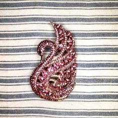 Pink Crystal Swan. Add something cute and sparkly to your favorite outfit! 2-1/2" tall and 1-1/2" wide. Not intended for children ages 13 and under.   Also, for many items we can accommodate large orders, so please send us a message. Pink Brooch Pins For Party, Pink Party Brooch Pins, Pink Crystal Brooch Jewelry, Pink Crystal Jewelry Brooch, Pink Crystal Brooches As Gift, Pink Rhinestone Brooches For Gifts, Pink Rhinestone Brooches As Gift, Glamorous Bling Brooches As Gift, Glamorous Bling Brooches As A Gift