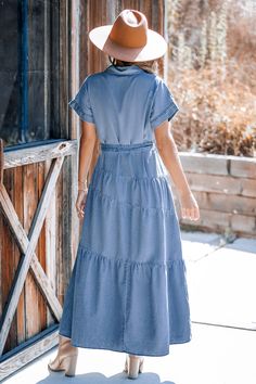 Effortlessly cool. The Blue Collared Front Button Maxi Shirt Dress combines the comfort of a T-shirt with the sophistication of a collared button-down. Perfect for those laid-back days when you still want to look put-together. Product code: CAA05A4H174ST Features:  Woven Collared neckline Short sleeves Front buttons Waist tie Maxi Wash Method: Regular Wash Material: 90%COTTON,10%POLYESTER. Casual Short Sleeve Solid Color Shirt Dress, Casual Short Sleeve Solid Shirt Dress, Casual Solid Color Short Sleeve Shirt Dress, Spring Solid Color Short Sleeve Shirt Dress, Rayon Short Sleeve Shirt Dress For Day Out, Casual Dress With Collared Neckline, Collared Cotton Shirt Dress In Solid Color, Collared Rayon Shirt Dress For Day Out, Short Sleeve Washed Blue Dress With Buttons