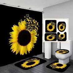 a bathroom with sunflowers and butterflies on the shower curtain, toilet seat covers and rugs