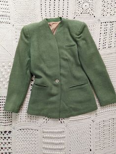 Vintage CC41 1930s 1940s wool jacket/blazer in a apple green colour oXS/S - measures 36" bust pit to pit - mannequin is 34.5". Message me for more information oTailored jacket oFully lined and shoulder pads o2 pockets oMade by Charles Butler In mint condition Shipping from France tracked Retro Green Formal Outerwear, Vintage Solid Blazer With Button Closure, Retro Green Blazer For Workwear, Retro Green Blazer For Work, Vintage Tailored Green Blazer, Classic Green Wool Blazer, Vintage Green Outerwear For Formal Occasions, Vintage Green Formal Outerwear, Vintage Green Fall Blazer