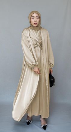 Aigerim 2 piece luxury 2 piece abaya with wrap bodice in beige - ANNAH HARIRI Eid Evening Solid Color Abaya, Elegant Beige Floor-length Sets, Elegant Floor-length Solid Abaya, Elegant Long Beige Sets, Eid Wedding Solid Color Abaya, Elegant Solid Color Wedding Abaya, Floor-length Beige Abaya For Eid, Satin Floor-length Abaya For Eid, Elegant Solid Color Abaya For Eid