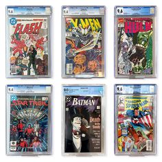 six different dc comics are on display in plastic cases