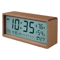 a wooden clock with the time displayed on it