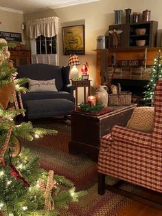 the living room is decorated for christmas with plaid furniture and holiday decorations on the tree