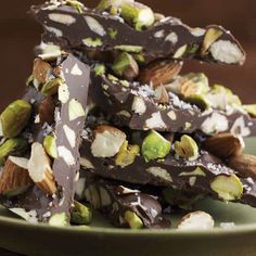 a pile of chocolate and pistachios on a plate