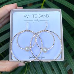 White Edison Pearl Hoop within a Hoop Earrings. PLEASE NOTE: The Edison pearls will vary in shape, size and color and will have natural occurring birthmarks. The pearls will range and measure from 9mm to 11mm. These are stock photos, the earrings you receive will be similar but different. NOTE: This listing is for ONE pair of earrings only. All White Sand Jewelry comes in a hand stamped gift box ready for gifting. PROCESSING TIME: Each piece is handcrafted and made-to-order, specifically for you Sand Jewelry, Marquise Earrings, Hippie Rings, Edison Pearls, Floating Necklace, Rainbow Rings, Mermaid Jewelry, Shell Ring, Pearl Hoop Earrings