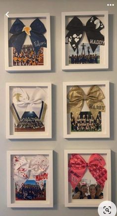 four framed pictures are hanging on the wall with different designs and colors, including bows