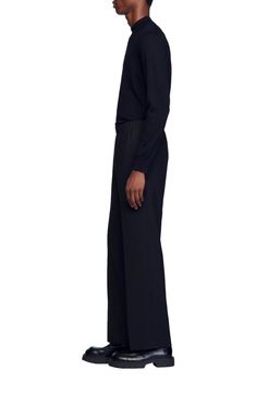 Wide-leg jersey trousers with an elasticated waist and pockets on the sides. Sandro Men's wide-leg trousers elasticated waist Side pockets The model is 5'8 tall and wears a size 36 Elastic Cuffs Sweatpants For Workwear, Wide Leg Sweatpants With Elastic Waistband For Work, Full Length Sweatpants With Side Pockets For Work, Stretch Workwear Pants With Elastic Cuffs, Workwear Sweatpants With Side Pockets, Workwear Pants With Elastic Cuffs, Black Wide-leg Pants With Ribbed Waistband, Workwear Trousers With Elastic Cuffs, Relaxed Fit Wide-leg Dress Pants With Elastic Waistband