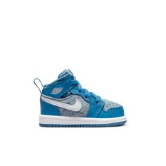 Your kiddo is all about summertime fun, and these Jordan 1s will bring the sunshine. Comfy and durable, the leather and tie-dye denim upper is built to last. A pull tab makes on-and-off extra easy so your little one can spend less time getting ready and more time playing outside.Leather and denim in the upper add durability.Soft, flexible midsole is lightweight and cushiony.Rubber outsole provides traction on a variety of surfaces.Pull tab at the collar makes it easy to put 'em on and take 'em o Air Jordan 1 Retro Mid, Jordan 1 Retro Mid, Leather And Denim, Dutch Blue, Dye Denim, Nike Air Jordan 1 Retro, Tie Dye Denim, Jordan 1s, Summertime Fun