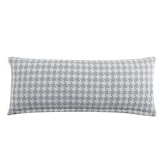 a gray and white pillow on a white background with an image of a hounds pattern