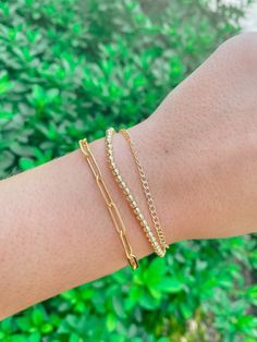 This every day paper clip bracelet is so cute. Add it to your stack and your sure to get some compliments. It's made of 14k Gold Fill and measures 7 inches in length! Please email Hello@shoplemel.com for size adjustments. Details 14k Gold Fill Link Length: 13x 3.8mm Length: 7" Please email Hello@shoplemel.com for size adjustments. Trendy Adjustable Paperclip Bracelet With Oval Link, Chic Adjustable Bracelets With Paperclip Chain, Trendy Paperclip Chain Bracelet, Trendy Paperclip Bracelet With Oval Links, Trendy Chain Bracelet With Rectangular Links, Trendy Adjustable Paperclip Chain Bracelet, Modern Paperclip Chain Bracelets, Modern Paperclip Bangle Bracelet For Everyday, Trendy Everyday Paperclip Chain Bracelet