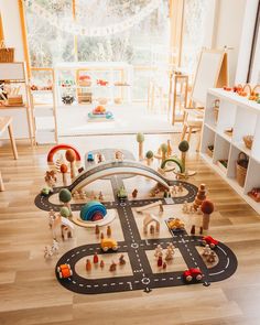 a child's play room with toy cars and toys