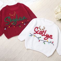 🎁  Adorable Xmas Personalization for Your Little Star  🎅Celebrate the holiday season in style with this adorable and personalized sweater that is perfect for your little one. Each sweater is meticulously hand-embroidered with a festive Christmas design and can be customized with your baby's name for a special touch.Our baby sweaters are not just clothing; they are tiny treasures adorned with intricate hand embroidery that speaks volumes of the care and attention put into each stitch. 🎄 🌟 Pro Christmas Baby Names, Embroidery Guide, Kids Christmas Sweaters, Xmas Outfits, Personalized Sweater, Pull Bebe, Custom Baby Gifts, My First Christmas, Baby Christmas Gifts