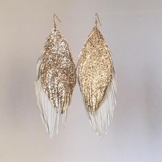 Leather feather earrings white and gold double leather feather | Etsy Gold Feathered Jewelry For Parties, Gold Feather Earrings For Party, Diy Leather Earrings, Gold Feathers, Leather Fringe, Colored Leather, Leather Tassel, Gold Leather, Leather Projects