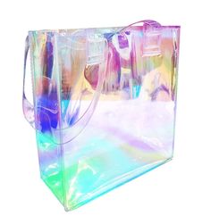 Going for a casual day out and taking along the essentials like a phone, compact, towel and a bottle of water? Then go out in style with this holographic clear tote bag that is multi-use with  a big capacity to carry as a shoulder handbag for shopping, gym, travel, the beach, and more. 

These holographic tote bags are not only cute, they’re pretty and perfect for casual use. They’re also convenient to take to shops and venues that take security a bit more seriously thanks to their transparent n Holographic Purse, Holographic Fashion, Rainbow Jelly, Holographic Iridescent, Holographic Bag, Clear Handbags, Clear Tote Bags, Everyday Tote Bag, Wet Bag