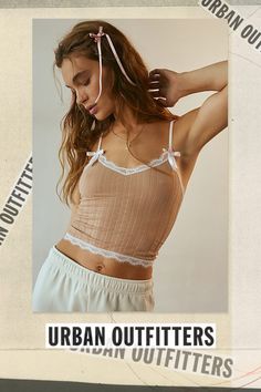 Better-than-basic Out From Under camisole in a slim, cropped fit. Designed in a soft pointelle knit featuring a sweetheart neckline and spaghetti straps. Topped with lace trim & bows for a sweet vibe. Only at Urban Outfitters. Features Out From Under Margot cami Lace trim tank top Soft & stretchy pointelle knit Sweetheart neckline with lace trim and spaghetti straps Bow details Lace trimmed hem Slim fit Cropped length Adjustable spaghetti straps UO exclusive Content + Care 94% Polyamide, 6% spandex Machine wash Imported Size + Fit Model in White is 5’10" and wearing size Small Measurements taken from size Small Chest: 20" Length: 17" | Out From Under Margot Cami in Brown, Women's at Urban Outfitters Feminine Fitted Cami Crop Top, Fitted Feminine Cami Crop Top, Trendy Lace Trim Camisole Crop Top, Fitted Spaghetti Strap Crop Top With Lace Trim, Fitted Crop Top With Lace Trim And Spaghetti Straps, Spring Cropped Crop Top With Delicate Straps, Ribbed Spaghetti Strap Crop Top, Cute Fitted Crop Top With Spaghetti Straps, Feminine Fitted Crop Top With Spaghetti Straps