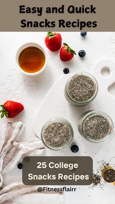 three small jars filled with food next to strawberries and blueberries