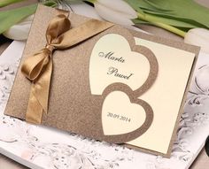 a close up of a wedding card on a table