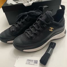 Authentic Chanel Sport Sneakers. Sourced By Jaidi Finds. Rarely Used, Like New. Size 37. Black/White. Comes With Box, Dustbags, Extra Laces (Never Used), Receipt, Camilla Sticker And Chanel Bows Chanel Bows, Black Chanel Sneakers, Chanel Trainers, Chanel Sport, Shoes Chanel, Chanel Sneakers, Sports Trainers, Trainer Sneakers, Black Sneakers