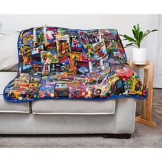 a couch covered in comic books and comics