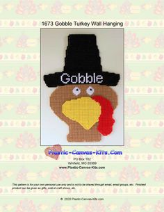 a turkey wearing a black hat with the word gobble on it