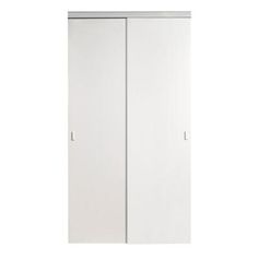 a white closet with two doors on each side