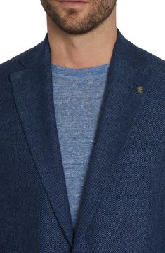 Constructed from a soft, wool-blend knit, this sport coat styled in a mottled blue features a relaxed profile that's ideal for elevating any casual look. 29 1/2" length (size 40R) Notched lapels Nonfunctional four-button cuffs Side vents Chest welt pocket; front patch pockets Partially lined 48% wool, 33% linen, 15% cotton, 2% silk, 2% elastane Dry clean Made in Canada Casual Navy Sport Coat With Welt Pockets, Blue Tweed Blazer With Notch Lapel, Casual Tailored Winter Sport Coat, Navy Casual Outerwear With Notch Lapel, Spring Blue Wool Blazer, Fall Business Blue Tweed Jacket, Blue Wool Tweed Jacket With Long Sleeves, Casual Tweed Outerwear With Welt Pockets, Casual Tailored Tweed Blazer