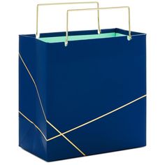 a blue shopping bag with gold lines on the handles and bottom, sitting upright against a white background