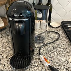 an espresso machine sitting on top of a counter