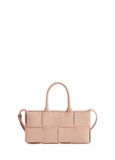 "Find BOTTEGA VENETA Mini East-west Arco Tote Bag on Editorialist. Bottega Veneta \"Arco\" tote bag in intreccio leather Rolled top handles Crossbody strap Can be worn as a top handle or crossbody bag Open top with magnetic closure Approx. 4.3\"H x 8.7\"W x 2.2\"D Made in Italy" Gold Luxury Bag With Woven Leather, Pink Rectangular Bag With Intrecciato Weave, Gold Leather Bag With Woven Detail, Pink Woven Leather Bag, Gold Woven Leather Bag, Pink Intrecciato Weave Rectangular Bag, Chic Rectangular Bag With Intrecciato Weave, Luxury Pink Shoulder Bag With Intrecciato Weave, Luxury Rectangular Satchel With Braided Handles